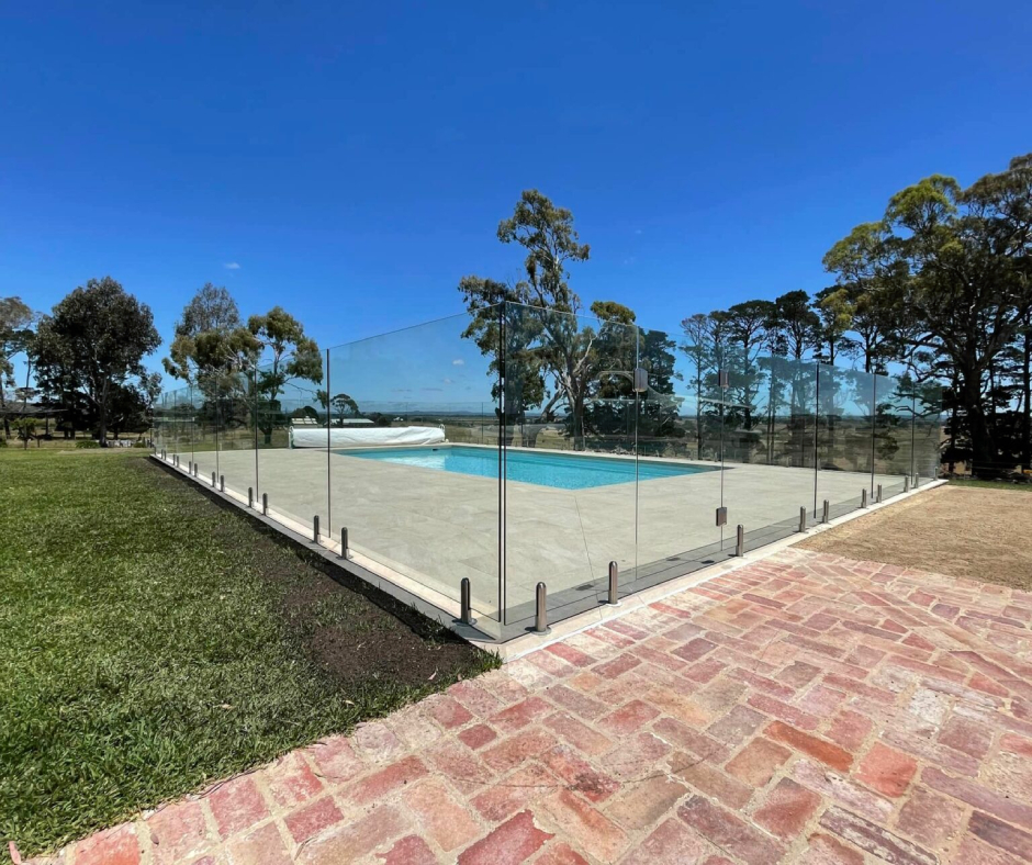 Corner detail of frameless glass pool fencing